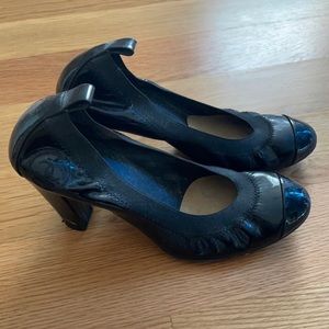 Chanel patent elastic pumps